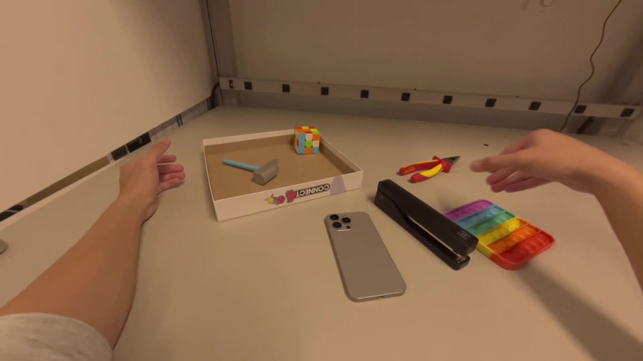 Egocentric robot pick-and-place clip representing dataset coverage scoring