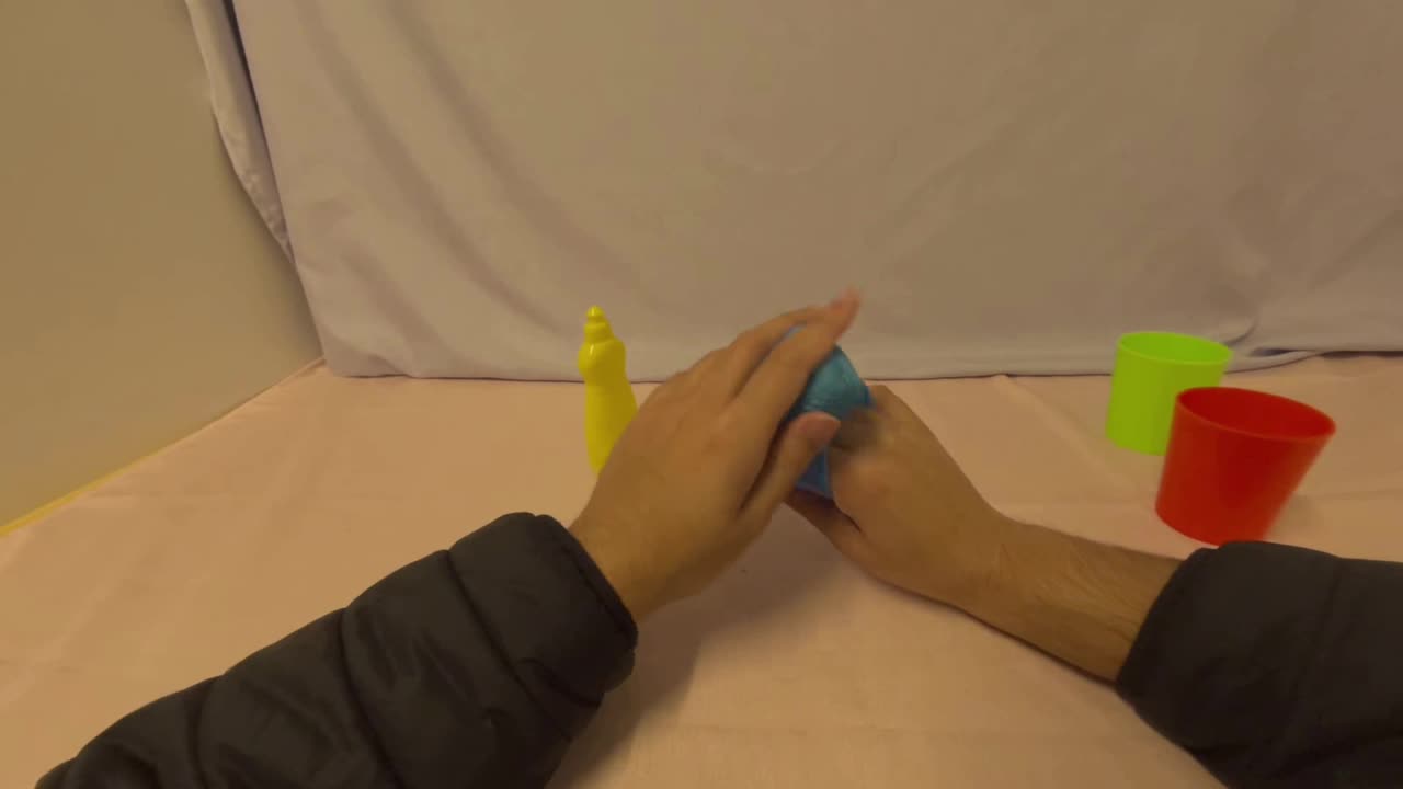 Egocentric cup-handling clip representing consensus-weighted review quality